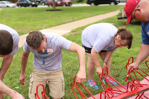 Volunteers Painting Playground Equipment Volunteers Painting Playground Equipment